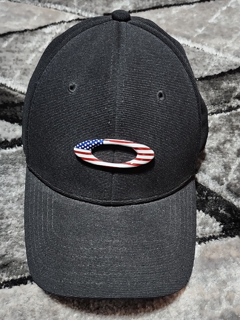 OAKLEY TINCAN BLACK CLASSIC LOW FLEX METAL US FLAG ELLIPSE LOGO FITTED L/XL HAT